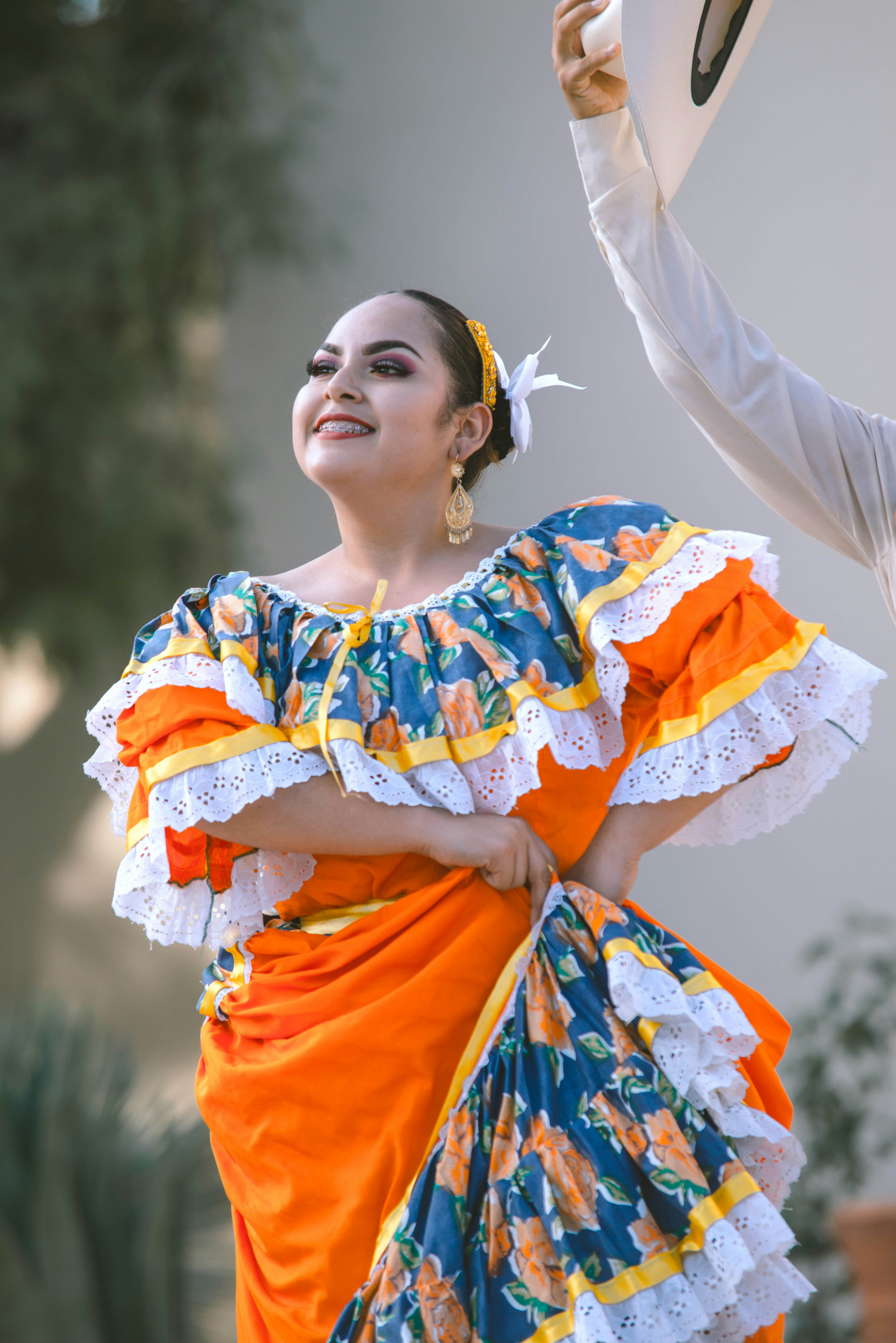 woman dancing near person
