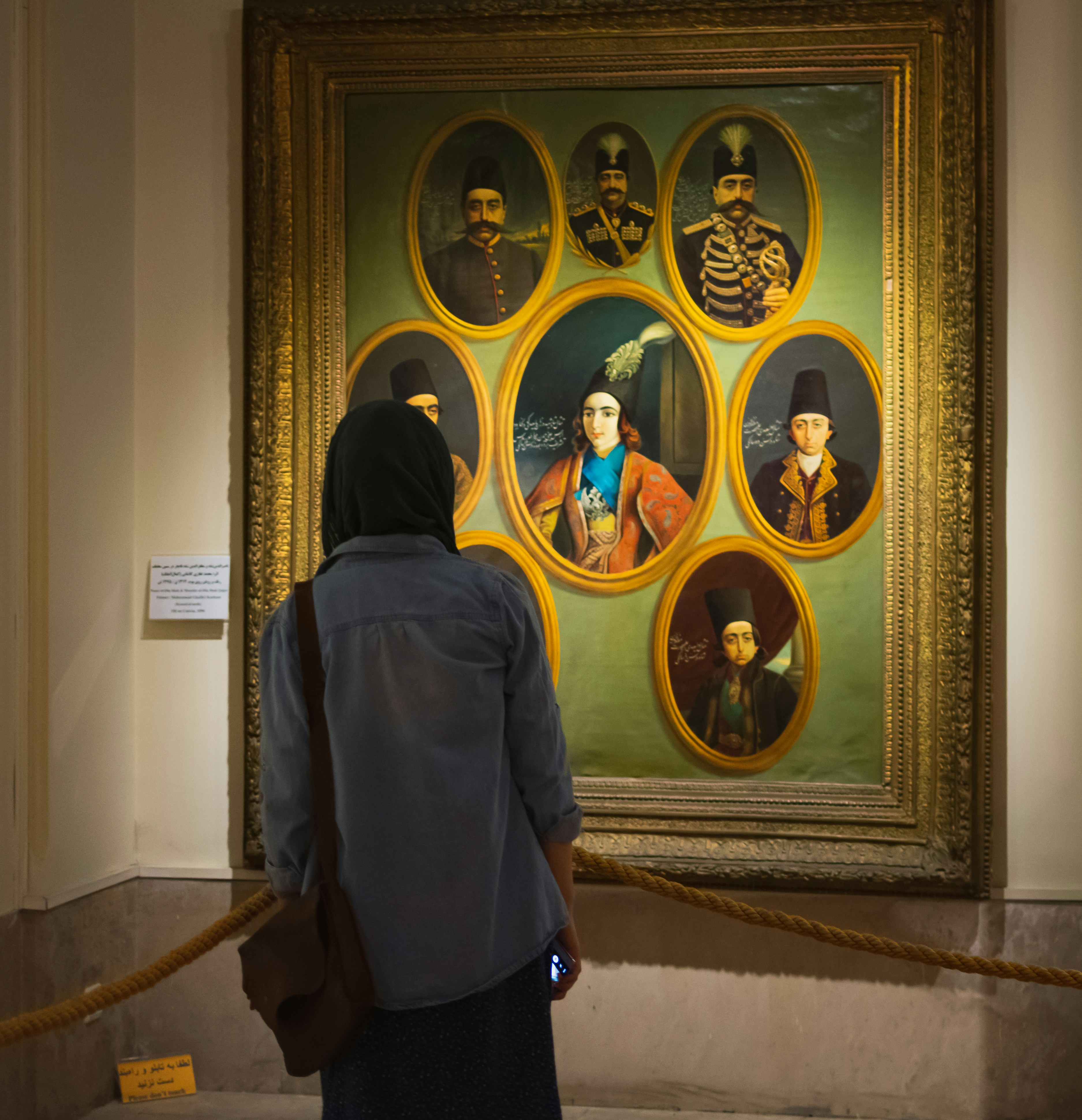 unknown person facing on painting